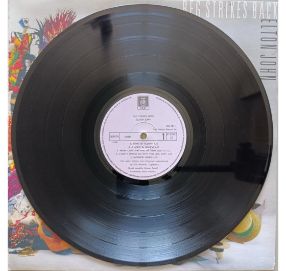Elton John - Reg Strikes Back
